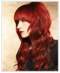 Click here to try on this hairstyle Model with long red waves