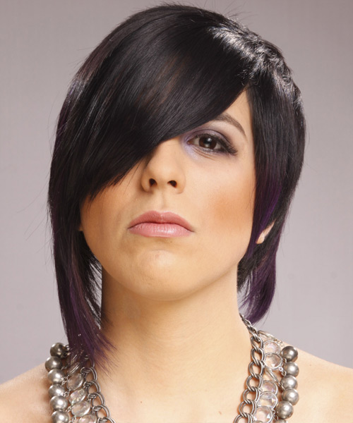 Short And Flamboyant Black Hairstyle With Tapered Back