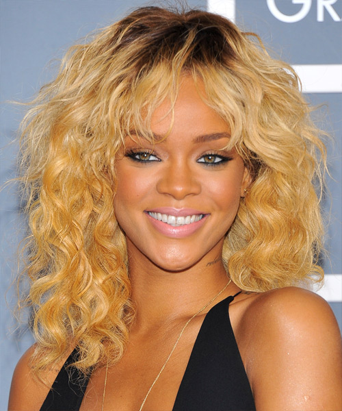 Rihanna Medium Wavy Golden Blonde Shag Hairstyle with Layered Bangs